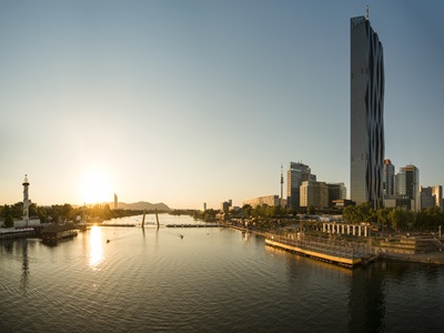 panorama vienna danube city and danube island Vienna - capitol of austria - at donau city, skyscrapers in the evening sun